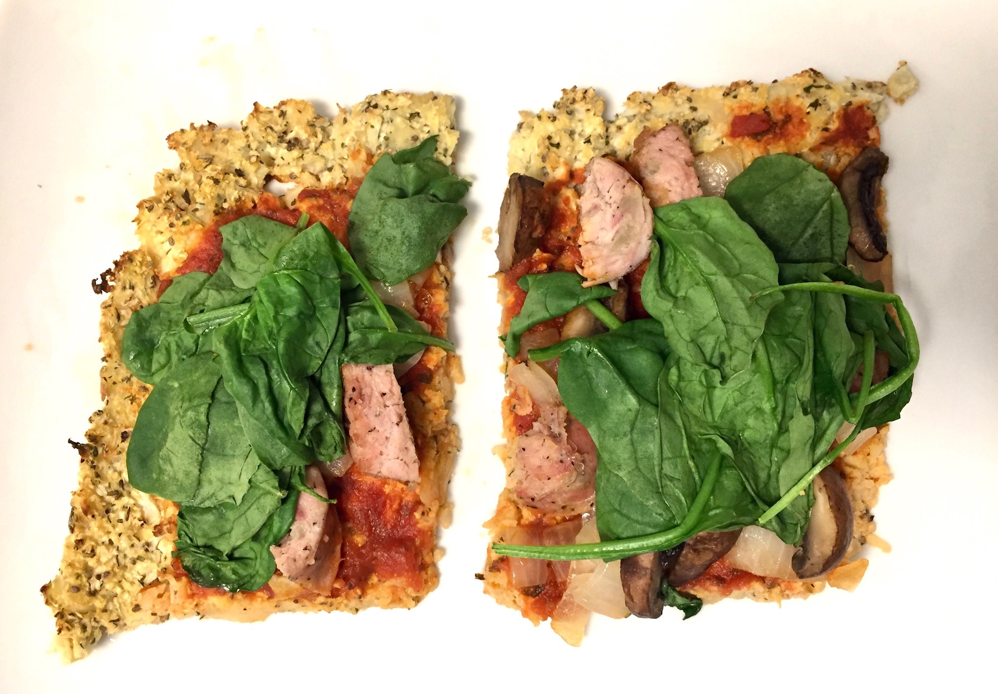 Paleo Cauliflower Pizza With Sausage And Spinach